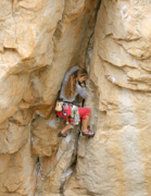 Enga Lokey doing her part for the "Wenches in Trenches" program, contorting herself up "Trojan" (25).