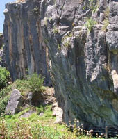 Here's another view of the crag, showing how steep the right end is. Too bad the holds have all come off...