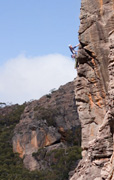 Jo on a new grade 17 arete.