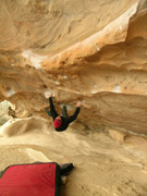 Scott on Spankin the monkey Bars direct, v8, at Hollow Mountain cave.