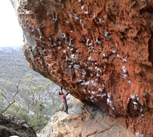 Me bouldering the start of Chain Of Fools, grade 23.