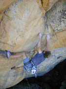 Gareth on the extreme crux of Red Right Hand (25/26)