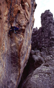 Kent Paterson attempts his stunning Super Mario Bros grade 25. He has unclipped from the earlier quickdraws to eliminate rope drag.