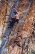 Nick McKinnon grapples with some small pockets on this grade 24.