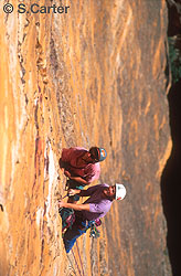 Simon Mentz (top) and Steve Monks contemplate pitch four Titan (26, 120 meters), Dogface, Blue Mountains, NSW, Australia. The Dogface cliff was formed by a landslide in the 1930's!