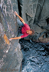 Simon Mentz, following pitch one The Free Route, on the Totem Pole at Cape Hauy, Tasman Peninsula, Tasmania, Australia.