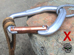 Do not load carabiner over an edge (Click To Enlarge)