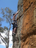 Phil Neville leading the grade 24 arete finish of Anal Crack, 12m grade 20.