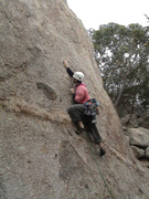 Me leading "Asylum for the Insane", grade 17 at Gravel Pit Tor.