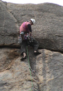 Me leading "Asylum for the Insane", grade 17 at Gravel Pit Tor.