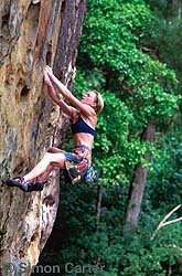 Monique Forestier bouldering above the sand flats in Bako National Park, near Kuching on the island of Borneo, Sarawak, Malaysia.